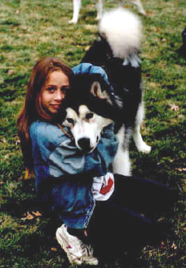 Steph gives Shadow a hug.